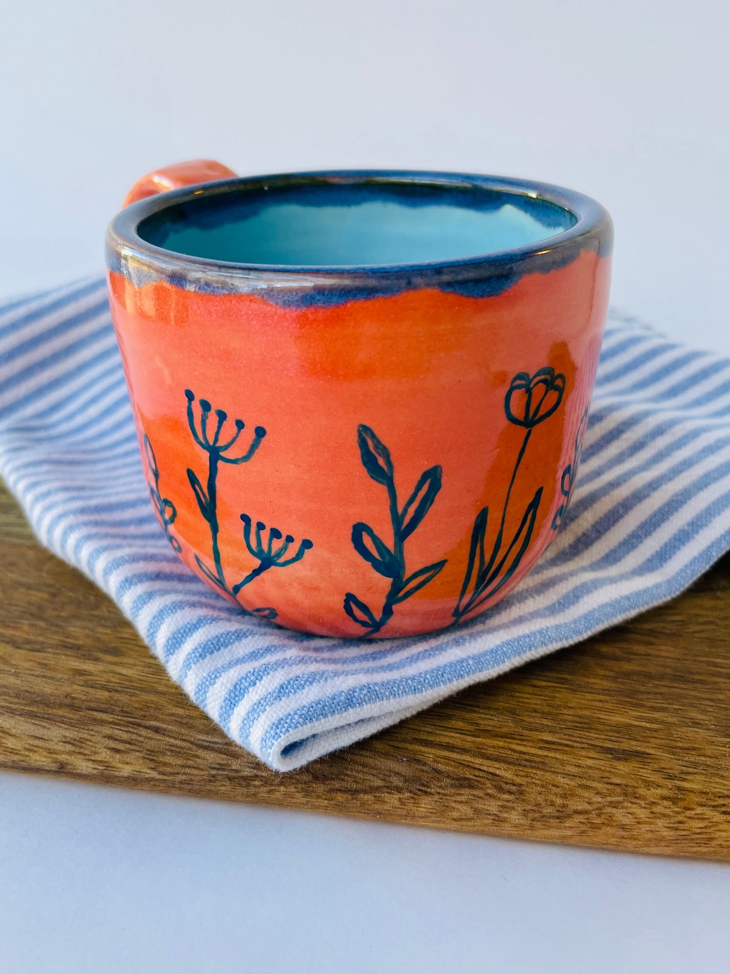 Coral Mug with Blue Flowers