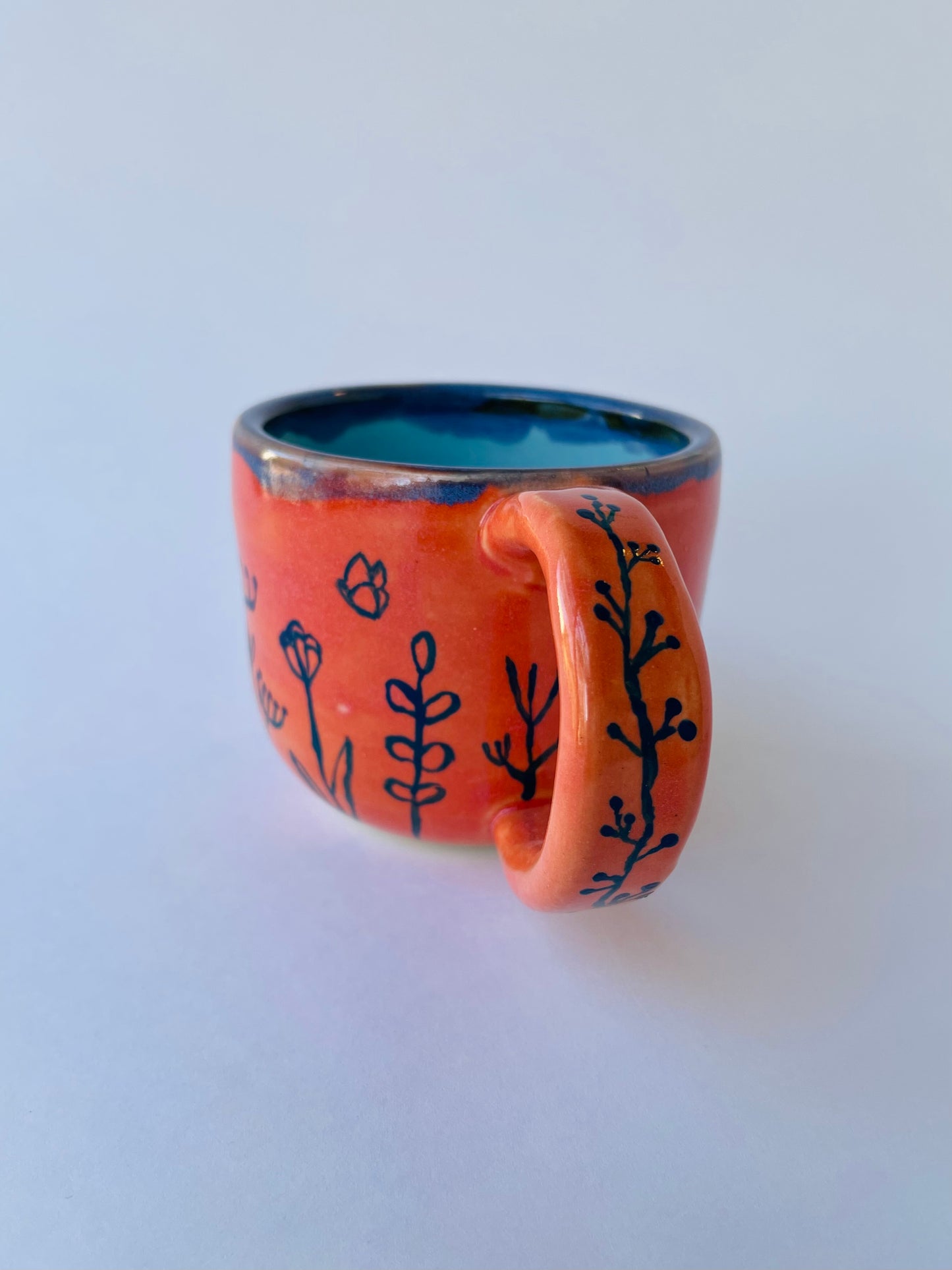 Coral Mug with Blue Flowers